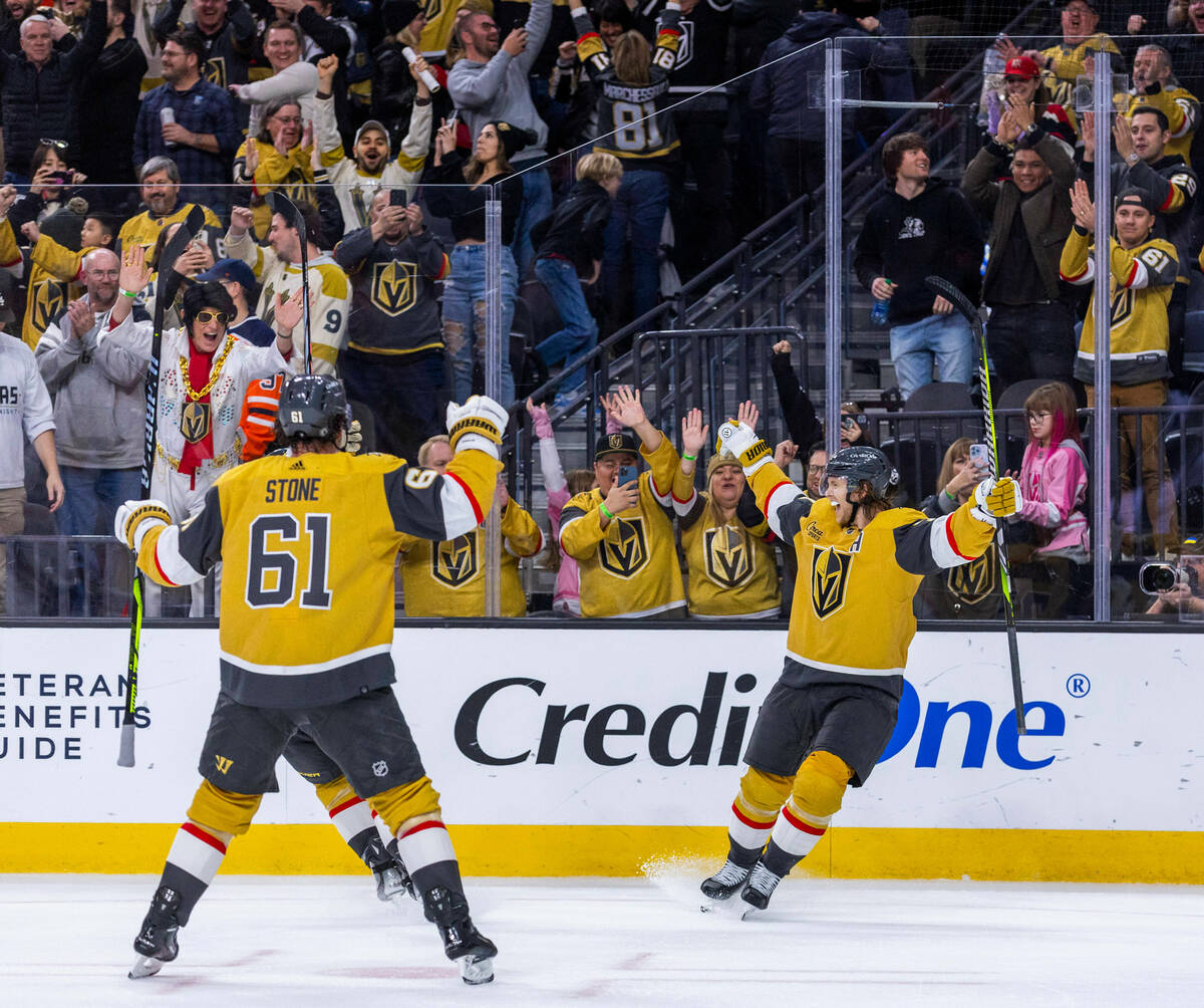 Golden Knights center William Karlsson (71) celebrates a goal with teammates against the Edmont ...