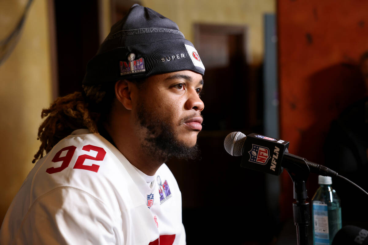 San Francisco 49ers defensive lineman Chase Young talks with the news media at Hilton Lake Las ...