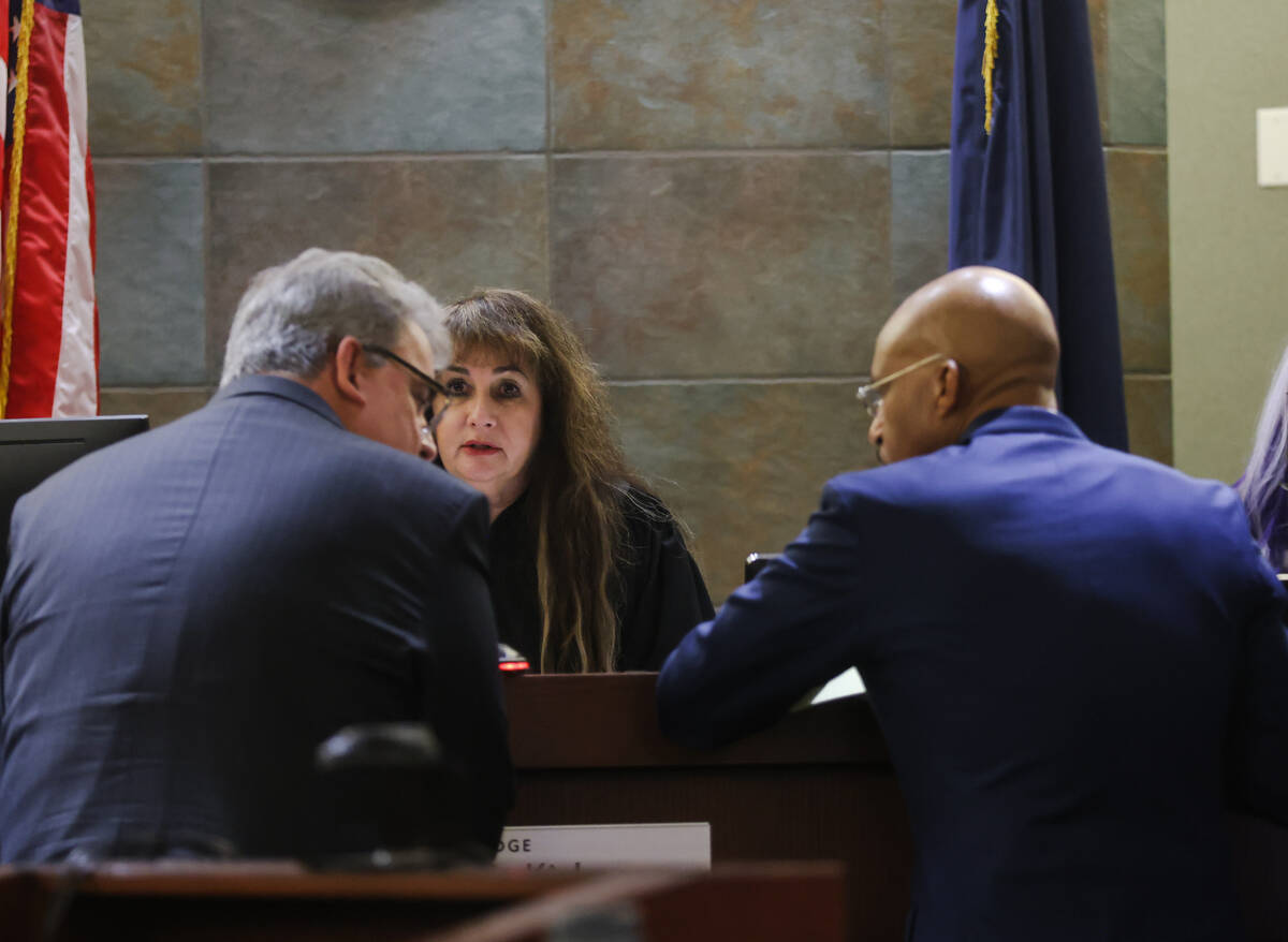 District Judge Joanna Kishner speaks with attorneys at a trial regarding a lawsuit against Real ...