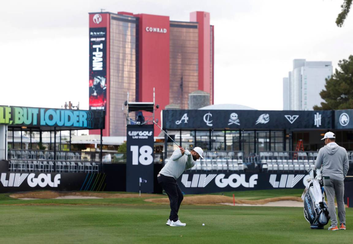 Jon Rahm prepares to hit onto the 18th green during LIV Golf Las Vegas Pro-Am tournament at Las ...