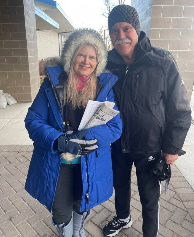 Bebe Carrico and her husband, David, were a few of the early birds at their Reno caucus site. T ...