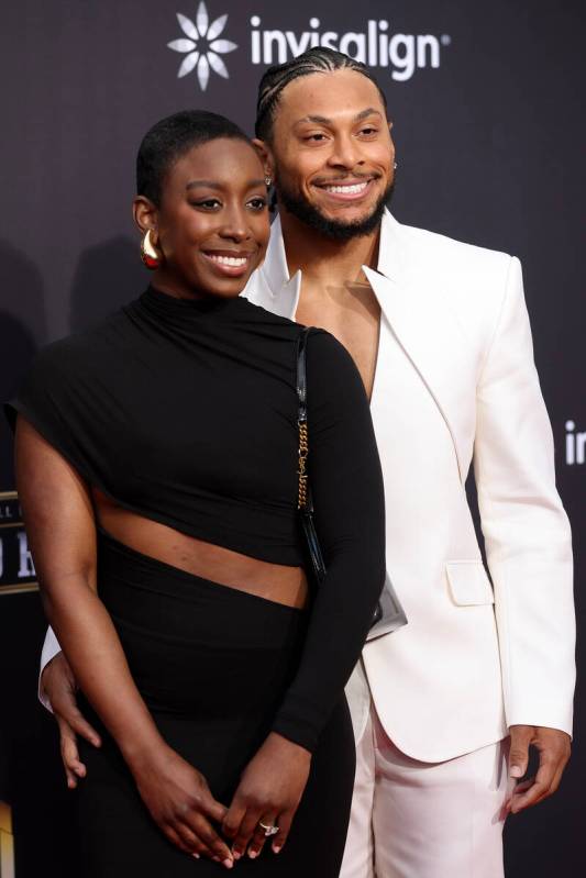 Antoine Winfield Jr. of the Tamba Bay Buccaneers poses with his fiancee on the red carpet befor ...