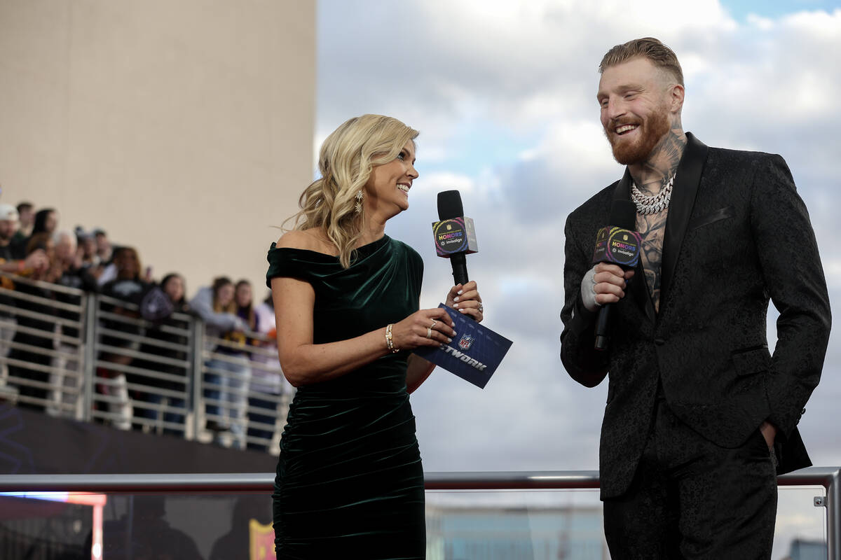 Las Vegas Raiders defensive end Maxx Crosby speaks with sports commentator Melissa Stark during ...