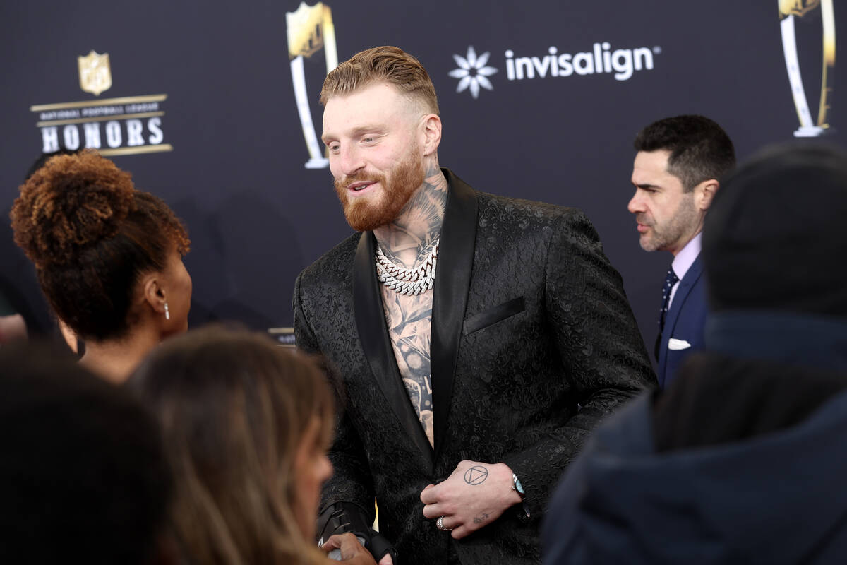 Las Vegas Raiders defensive end Maxx Crosby speaks with reporters on the red carpet before the ...