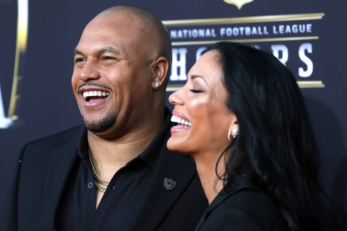 Las Vegas Raiders head coach Antonio Pierce and his wife Jocelyn Pierce walk on the red carpet ...