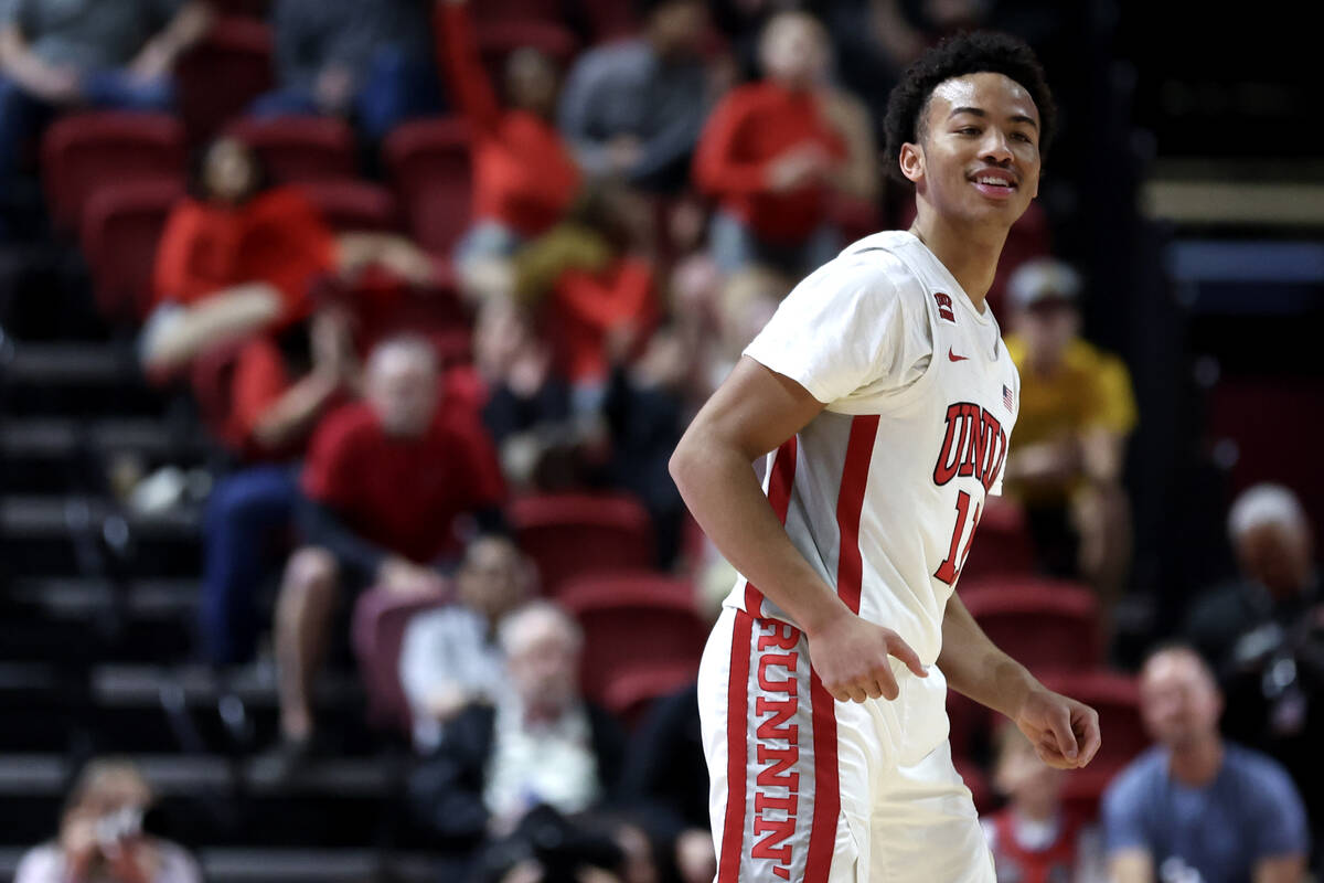 UNLV Rebels guard Dedan Thomas Jr. (11) celebrates after hitting a three-pointer during the sec ...