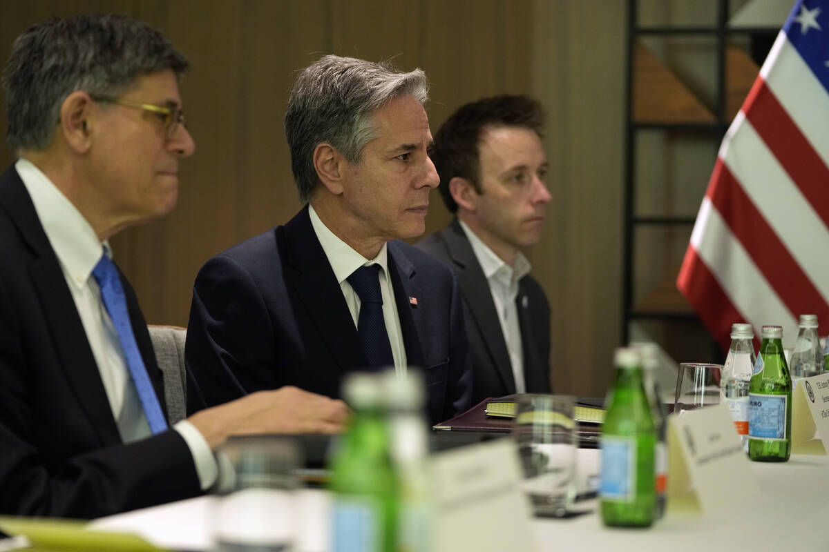 U.S. Secretary of State Antony Blinken, centre, meets with Israeli opposition leader Yair Lapid ...