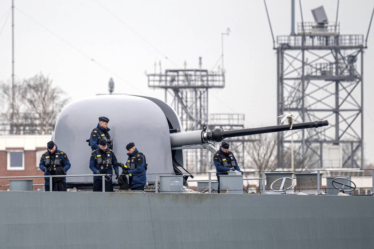 The frigate "Hessen" leaves the port at Wilhelmshaven, Germany, Thursday, Feb. 8, 202 ...