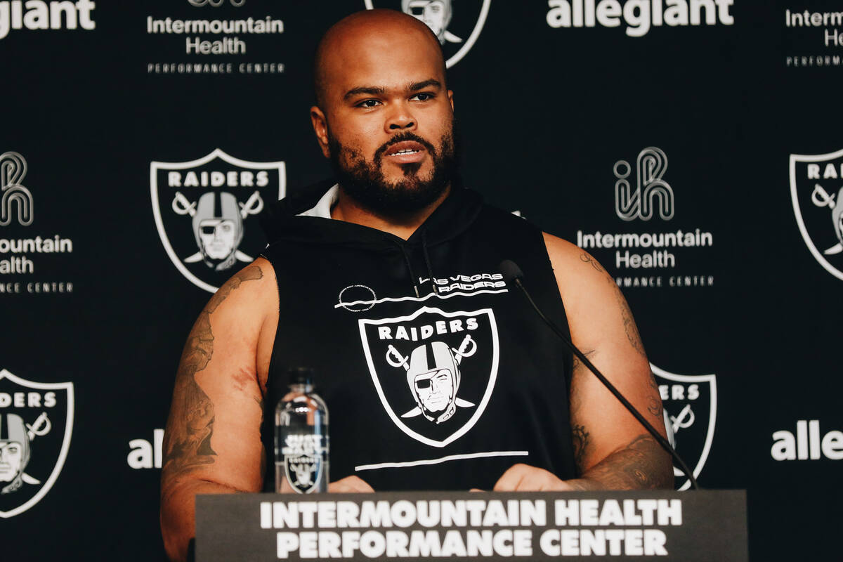 Raiders offensive tackle Jermaine Eluemunor speaks to the media during training camp at the Int ...