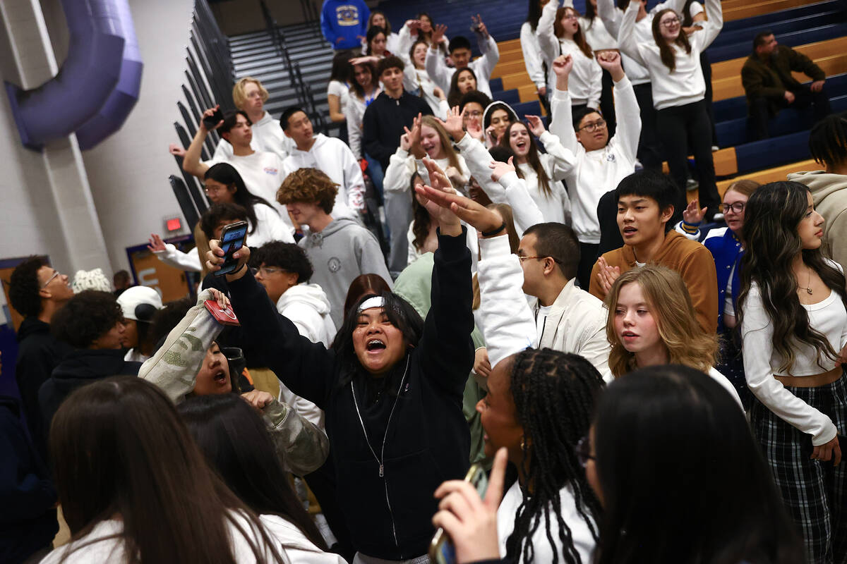 Sierra Vista fans cheer after their team won a Class 4A first round playoff high school basketb ...