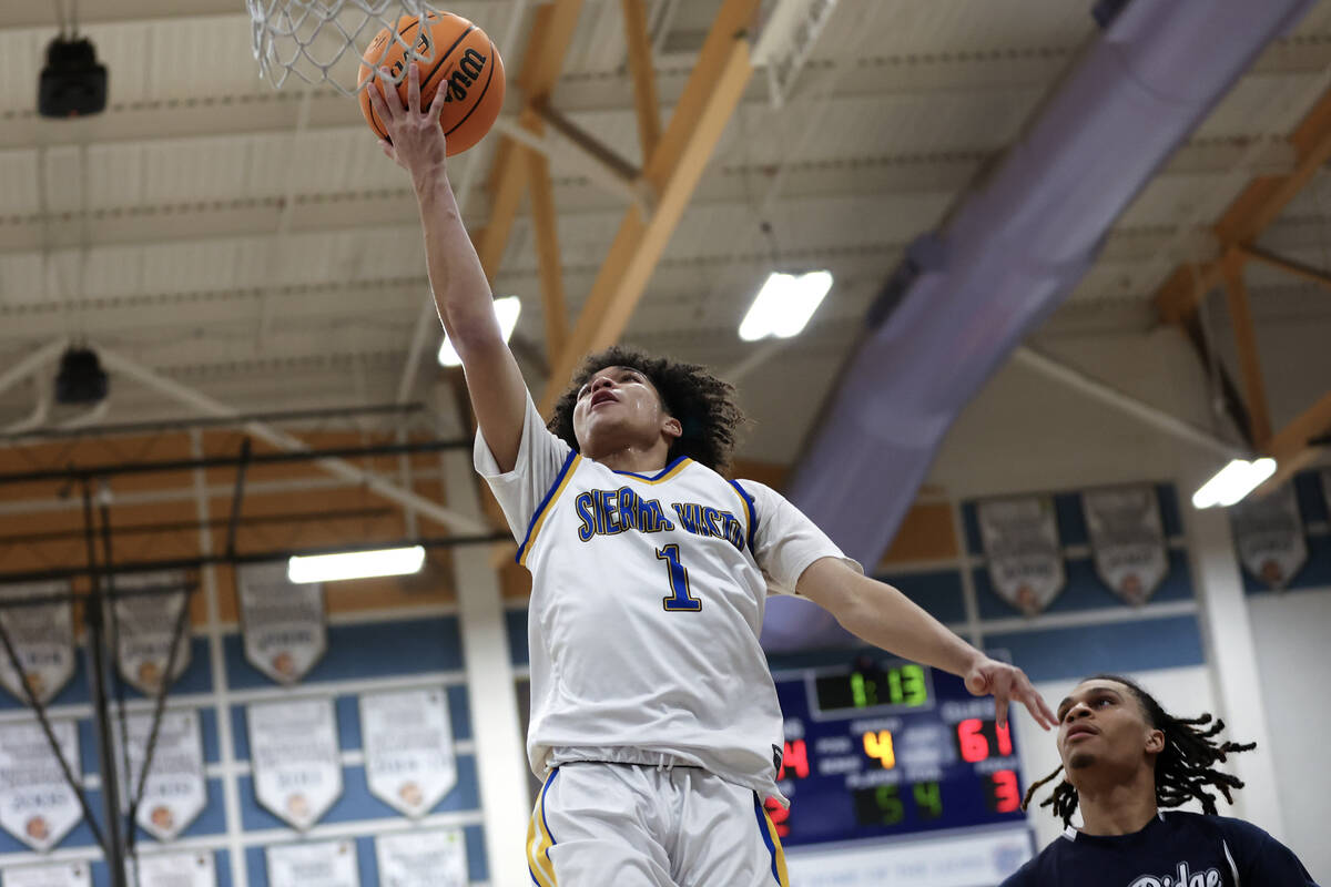 Sierra Vista guard Antonio McCraven (1) shoots over Shadow Ridge during a Class 4A first round ...