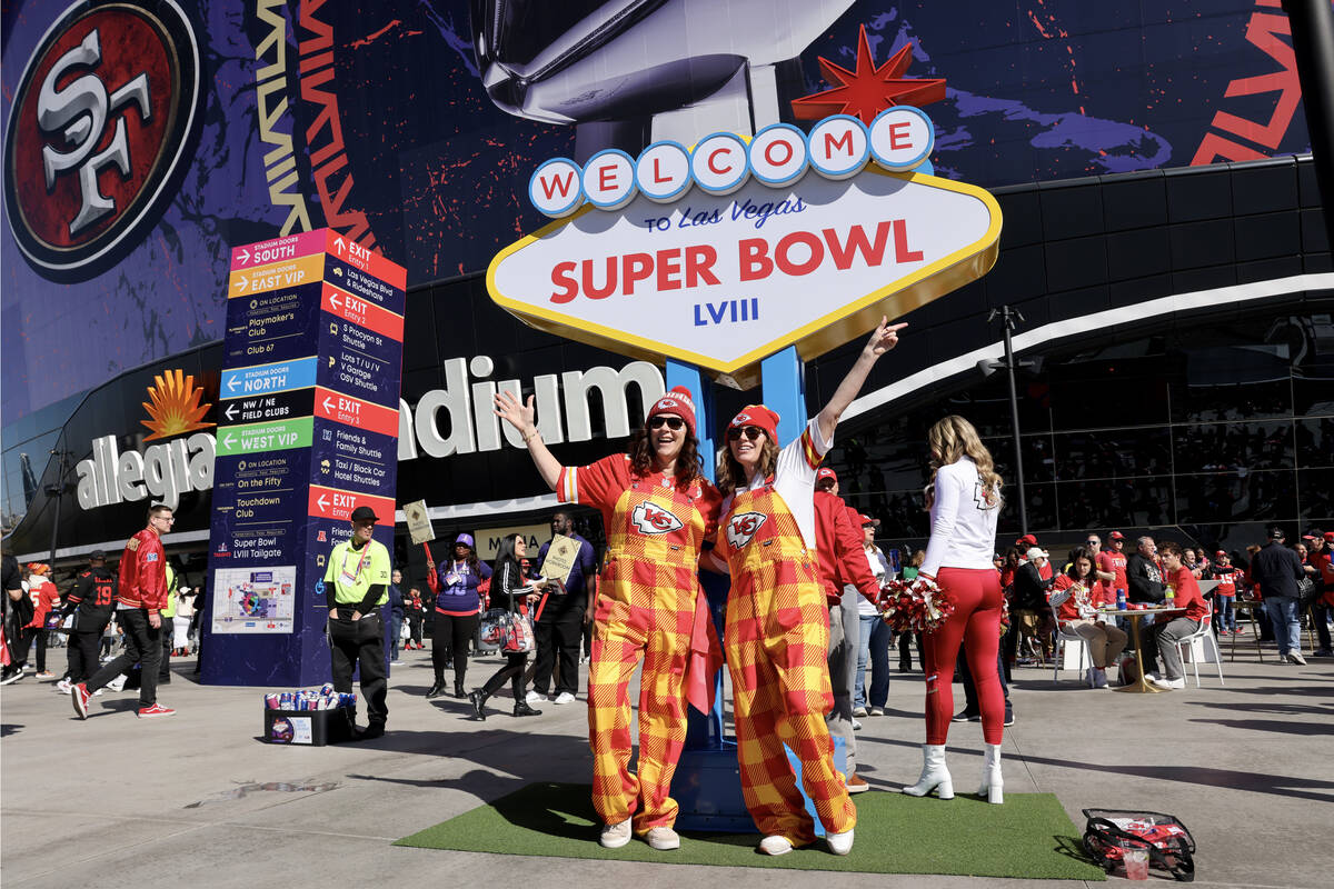 Chiefs fans sisters Margie Morrison of Kansas City, left, and Amy Glynn of Boise, Idaho celebra ...