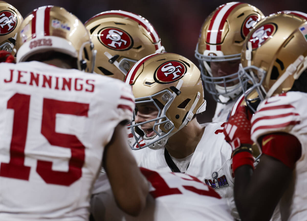 San Francisco 49ers quarterback Brock Purdy huddles with teammates during the first half of Sup ...