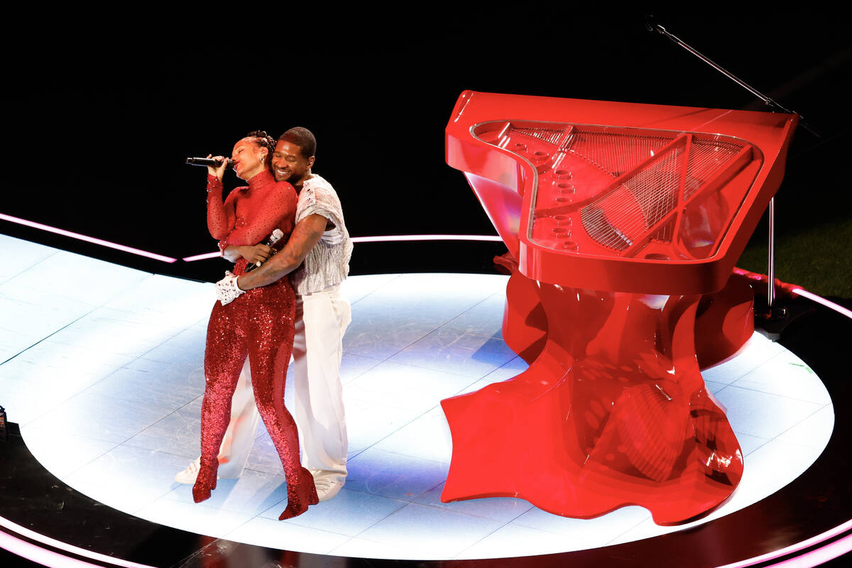 Usher and Alicia Keys perform during halftime of Super Bowl 58 Sunday, February 11, 2024, at Al ...