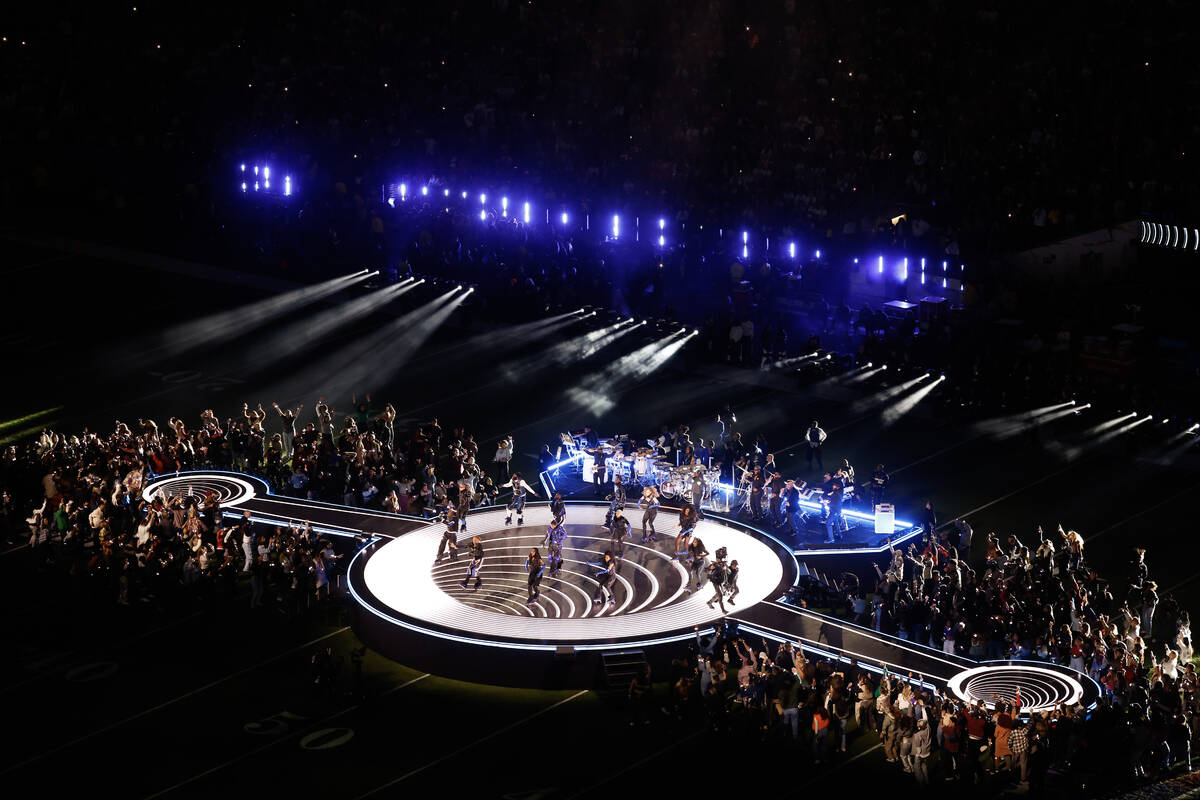 Usher performs during halftime of Super Bowl 58 Sunday, February 11, 2024, at Allegiant Stadium ...