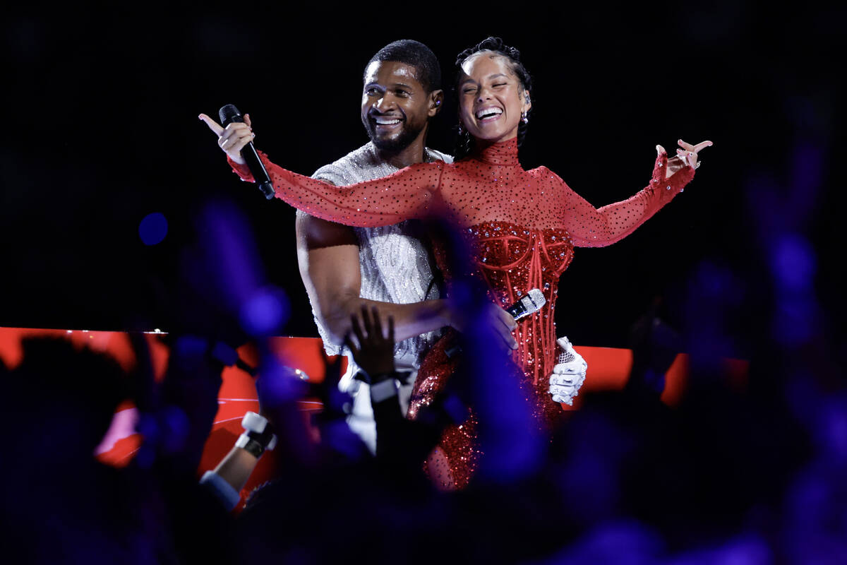 Usher and Alicia Keys perform during halftime of Super Bowl 58 Sunday, February 11, 2024, at A ...