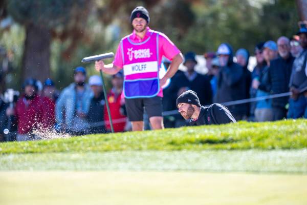 Matthew Wolff wedges out of a sand trap at hole #16 during the final round of the LIV Golf tour ...