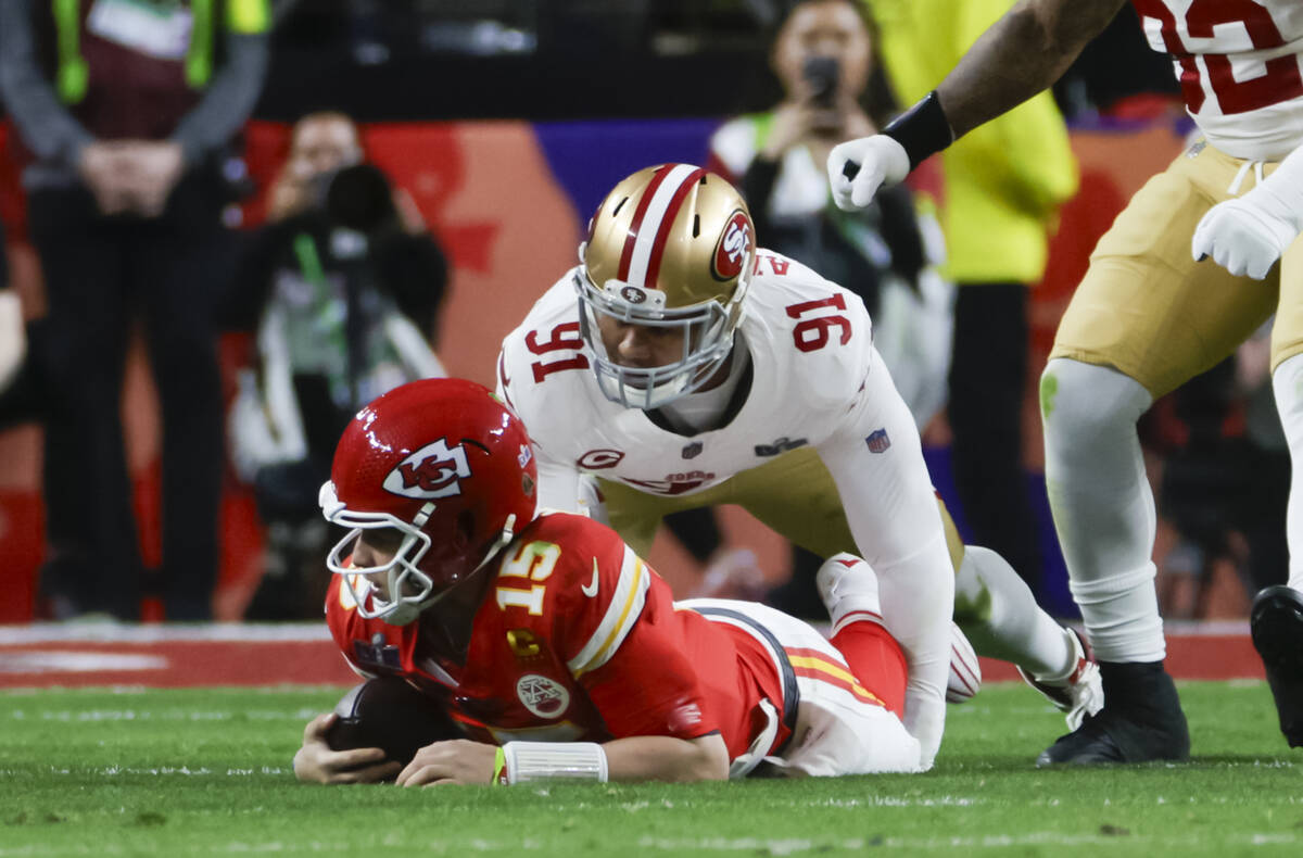 San Francisco 49ers defensive end Arik Armstead (91) sacks Kansas City Chiefs quarterback Patri ...