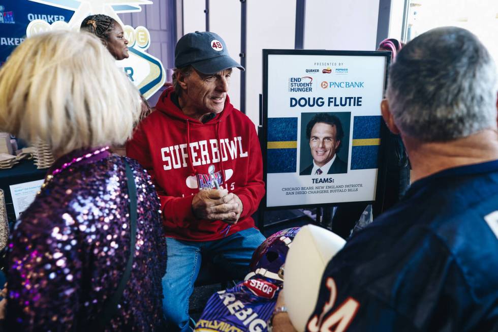 Former NFL quarterback and College Football Hall of Fame Doug Flutie speaks to fans at the Tast ...