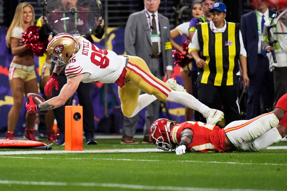 San Francisco 49ers tight end George Kittle (85) is stopped short of the goal line by Kansas Ci ...