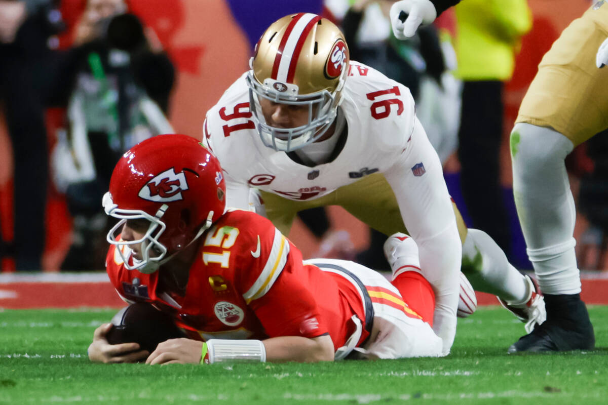 San Francisco 49ers defensive end Arik Armstead (91) sacks Kansas City Chiefs quarterback Patri ...