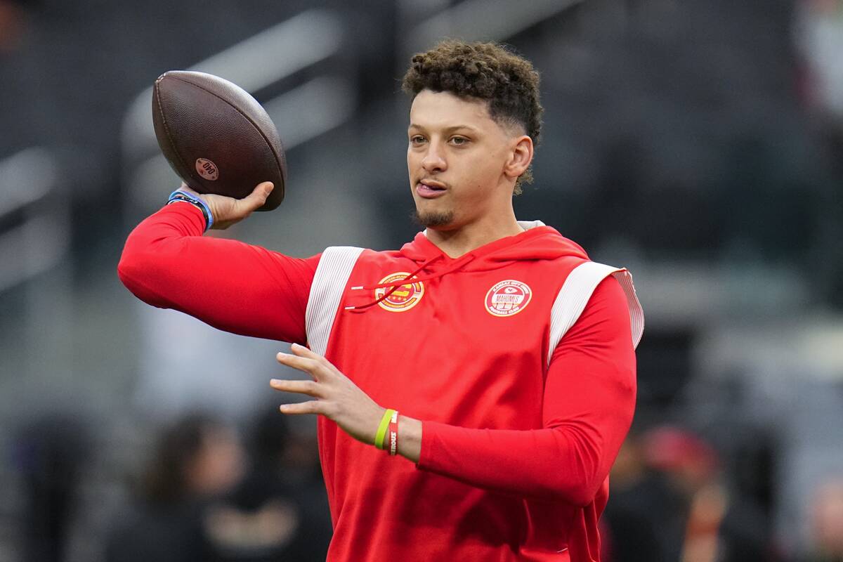 Kansas City Chiefs quarterback Patrick Mahomes warms up before the NFL Super Bowl 58 football g ...