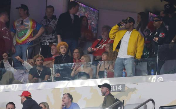 Taylor Swift, center right, looks on during the first half of Super Bowl 58 between the Kansas ...
