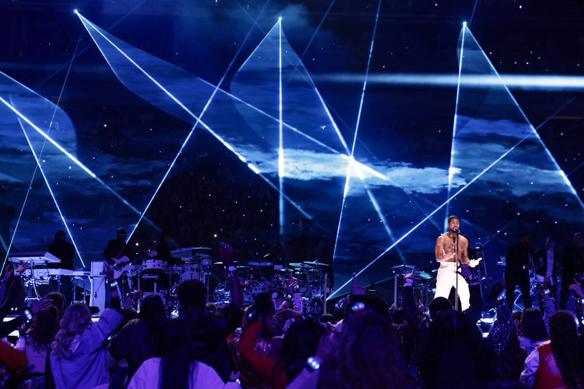 Usher performs during halftime of Super Bowl 58 Sunday, February 11, 2024, at Allegiant Stadiu ...