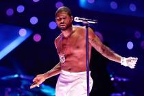 Usher performs during halftime of Super Bowl 58 Sunday, February 11, 2024, at Allegiant Stadiu ...