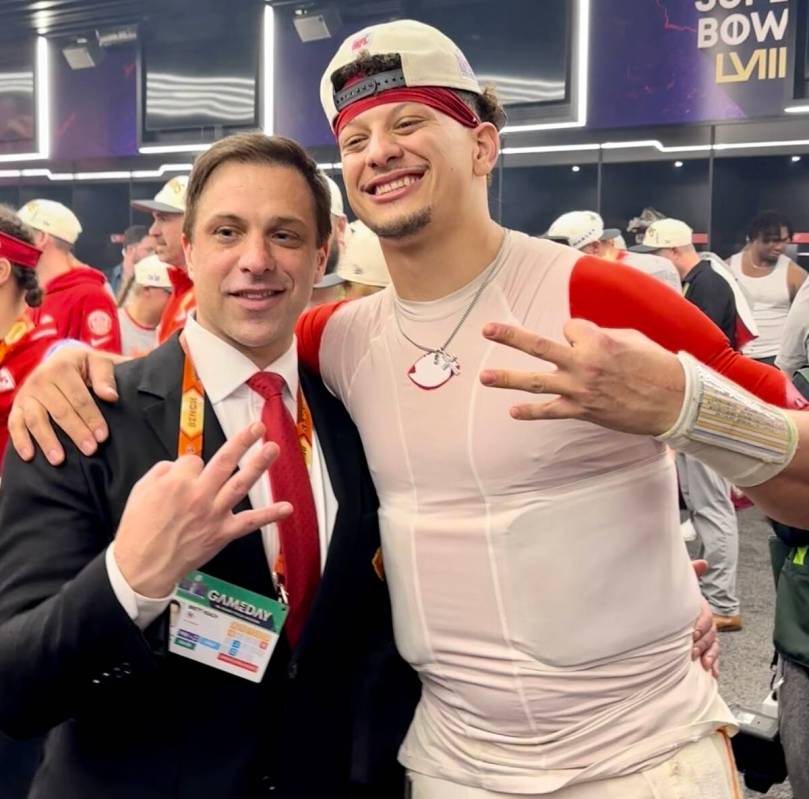 Kansas City Chiefs general manager Brett Veach poses with Chiefs quarterback Patrick Mahomes in ...