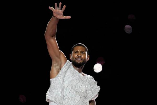 Usher performs during halftime of the NFL Super Bowl 58 football game between the San Francisco ...