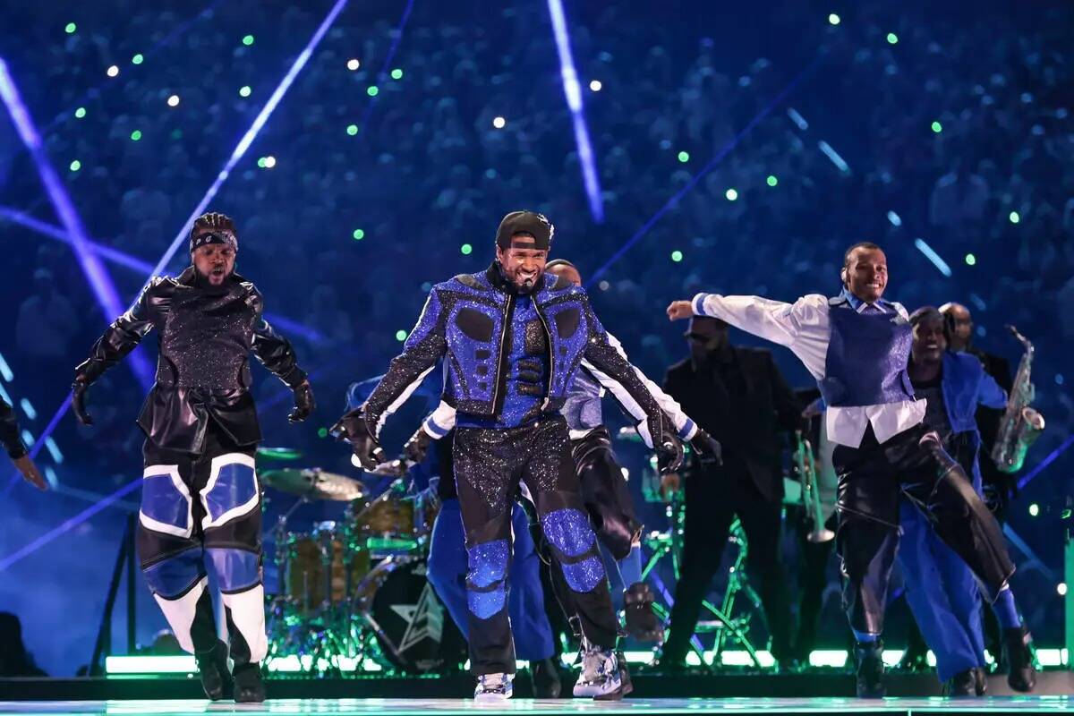 Usher perforrms at halftime of Super Bowl LVIII at Allegiant Stadium in Las Vegas on Sunday, Fe ...