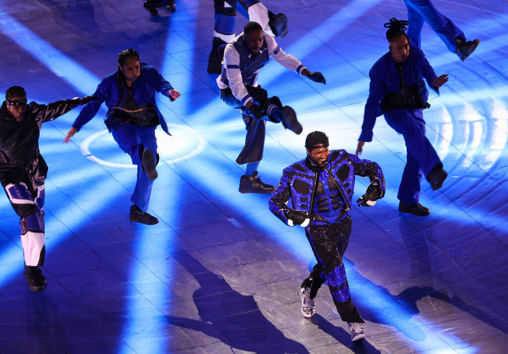 Usher performs during the halftime show at Super Bowl 58 at Allegiant Stadium on Sunday, Feb. 1 ...