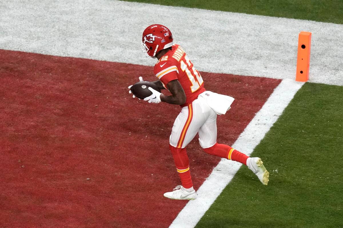 Kansas City Chiefs wide receiver Mecole Hardman Jr. (12) scores the wining touchdown in overtim ...