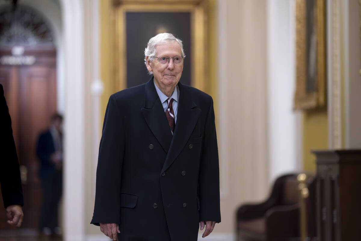 Senate Minority Leader Mitch McConnell, R-Ky., arrives as the Senate moves closer to a final vo ...