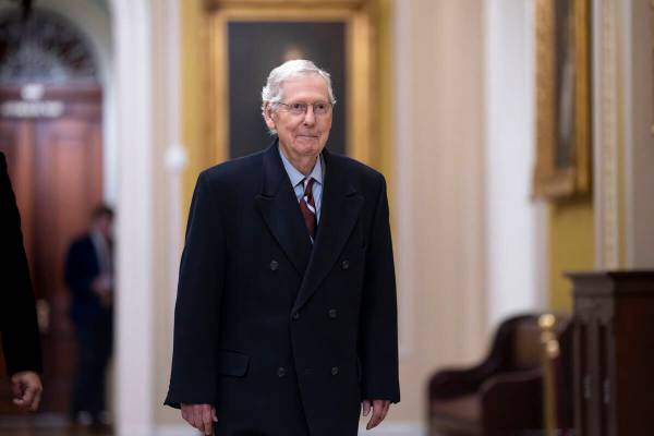 Senate Minority Leader Mitch McConnell, R-Ky., arrives as the Senate moves closer to a final vo ...