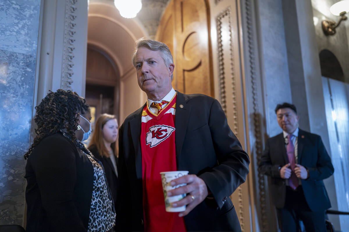 Sen. Roger Marshall, R-Kan., arrives as the Senate prepares a procedural vote on an emergency s ...
