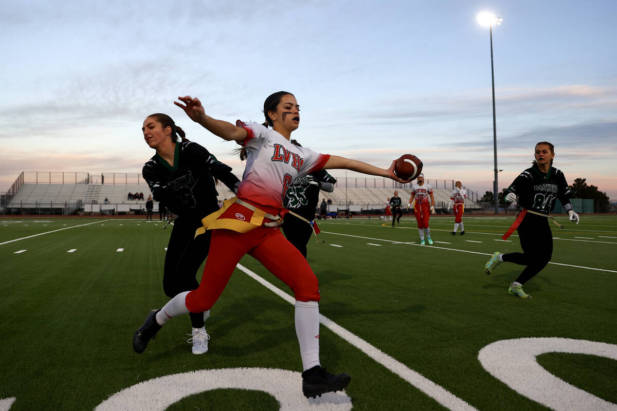 Las Vegas quarterback Sarah Pasquali (6) runs the ball into the sidelines while Palo Verde can& ...