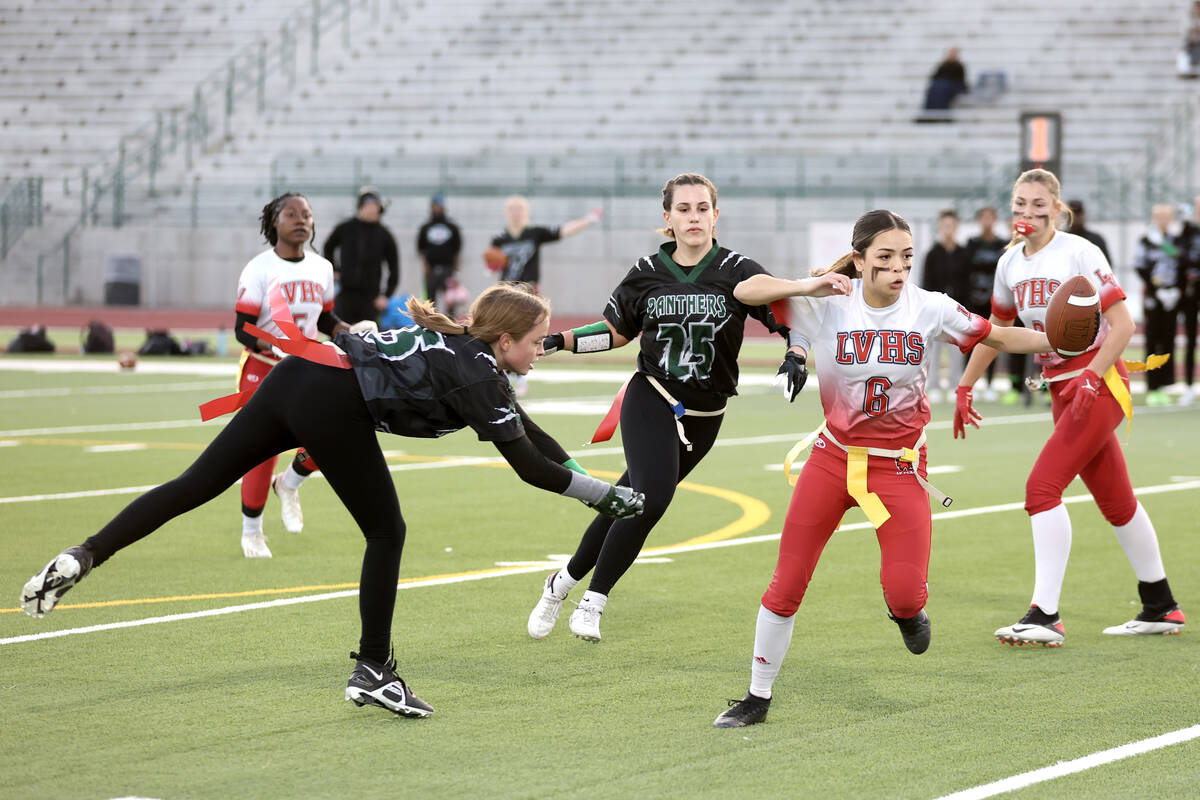 Las Vegas’ Sarah Pasquali (6) carries the ball up the field while Palo Verde’s Al ...