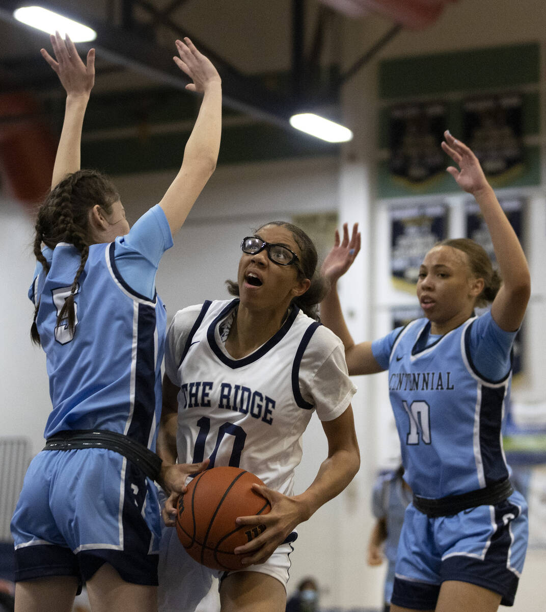 Shadow Ridge’s Jaslyn Jefferson (10) shoots against Centennial’s Trysta Barrett ( ...