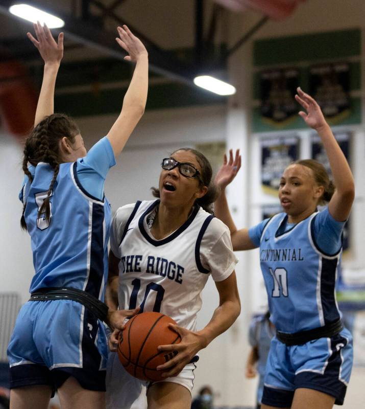 Shadow Ridge’s Jaslyn Jefferson (10) shoots against Centennial’s Trysta Barrett ( ...