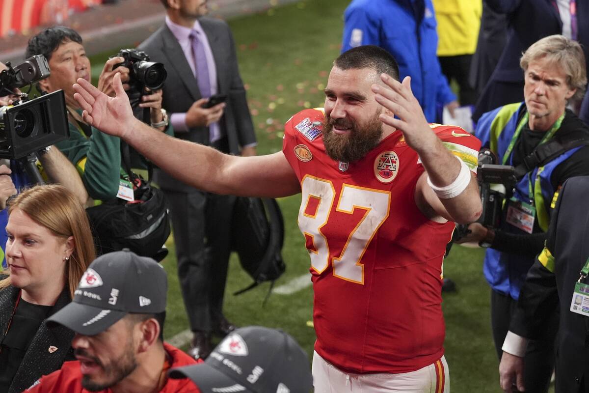 Kansas City Chiefs tight end Travis Kelce (87) walks off the field after the NFL Super Bowl 58 ...
