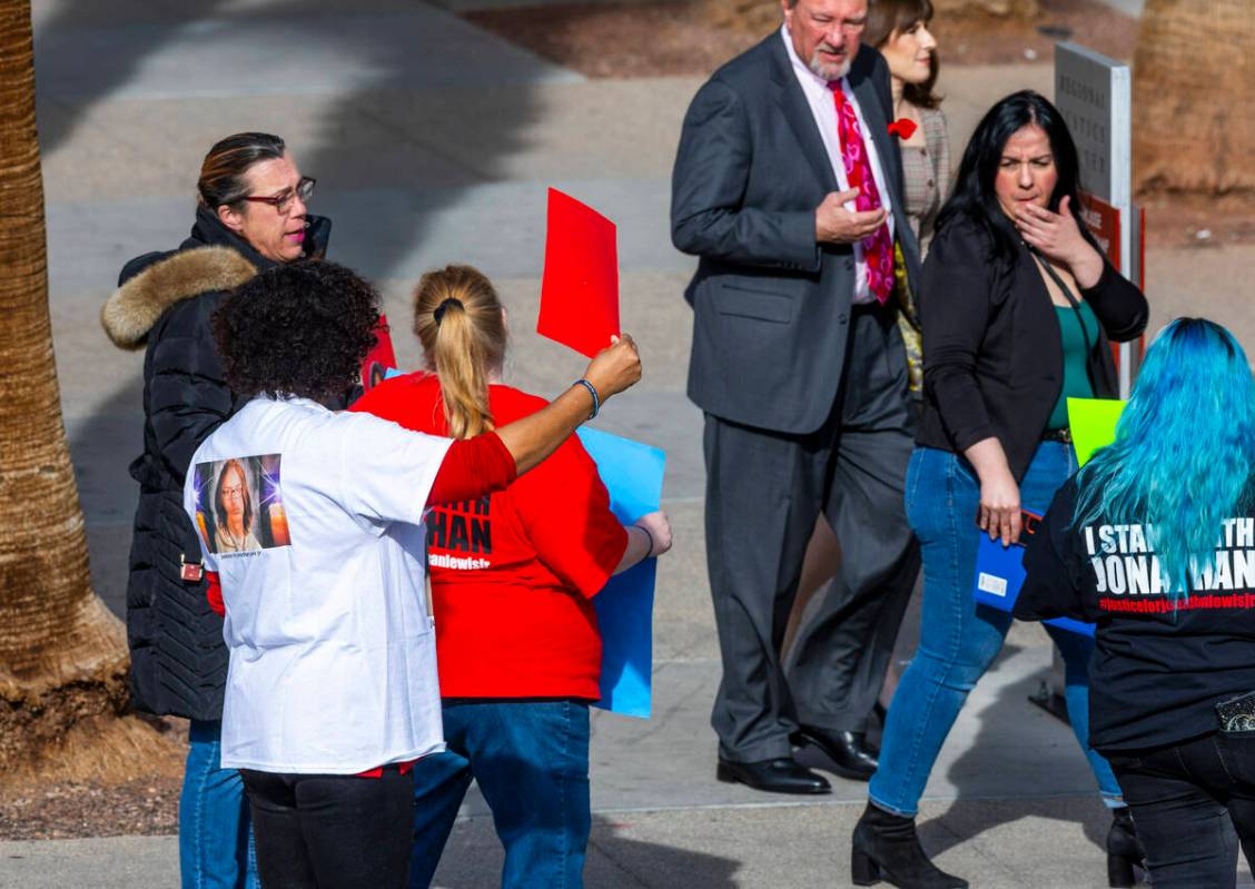 Family and supporters of Jonathan Lewis, killed in a beating near Rancho High School, hold rall ...