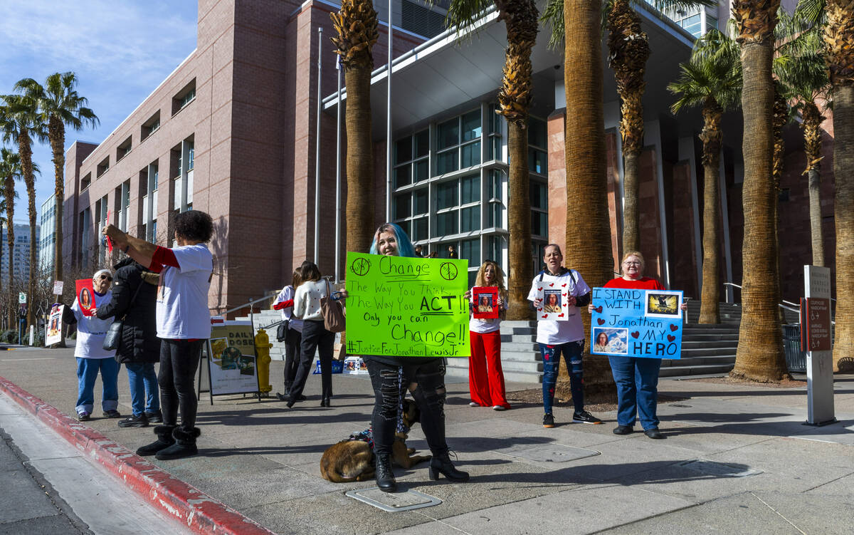 Family and supporters of Jonathan Lewis, killed in a beating near Rancho High School, rally out ...