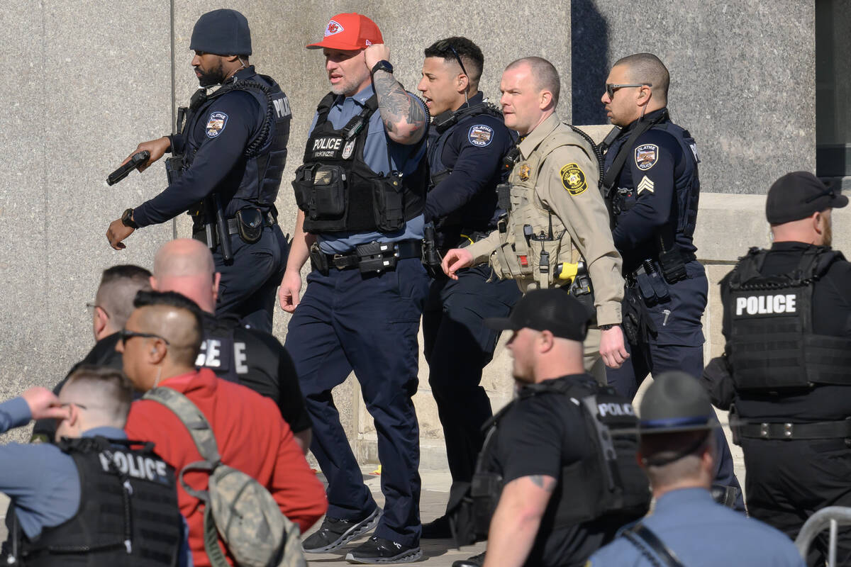 Law enforcement personnel arrive at Union Station following a shooting at the Kansas City Chief ...