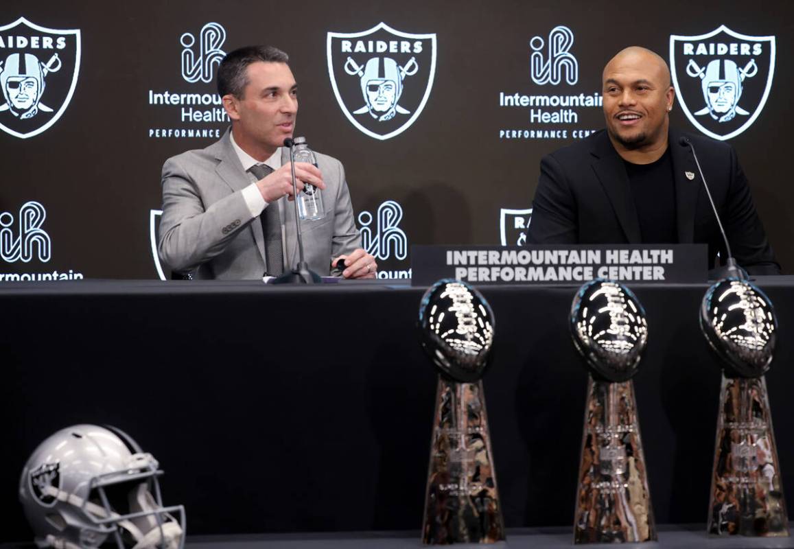 Tom Telesco, left, and Antonio Pierce are introduced as general manager and coach during a pres ...