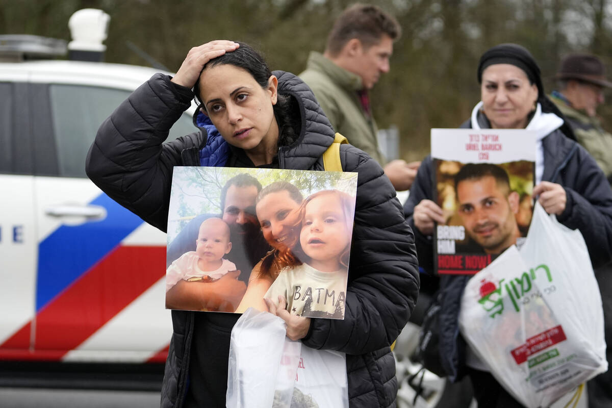 Families of hostages and former hostages arrive near the International Crime Court at The Hague ...