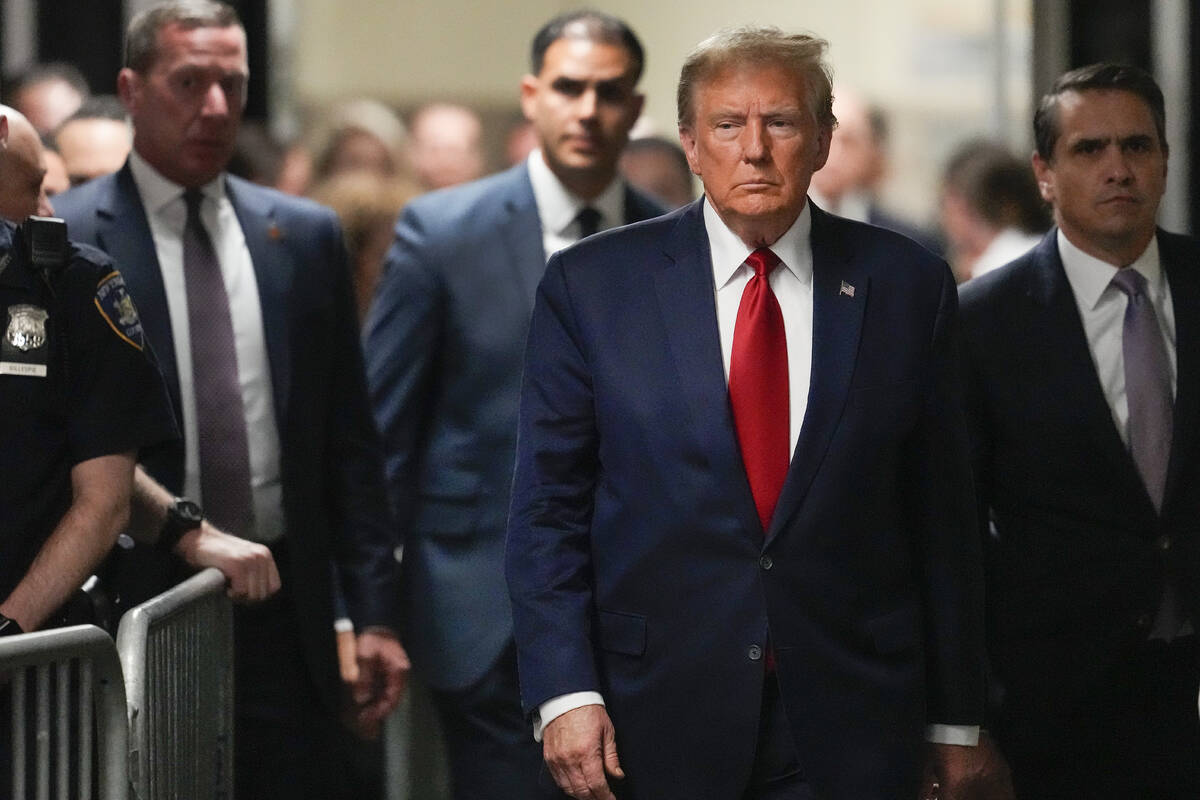 Former President Donald Trump arrives at Manhattan criminal court, Thursday, Feb. 15, 2024, in ...