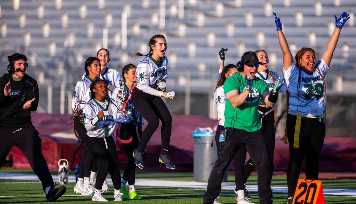 Palo Verde players celebrate a touchdown over Desert Oasis during the first half of their Class ...