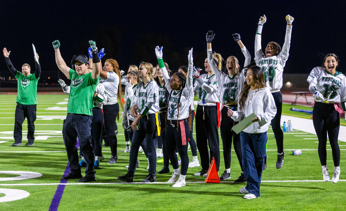 Palo Verde players celebrate a touchdown over Desert Oasis during the first half of their Class ...